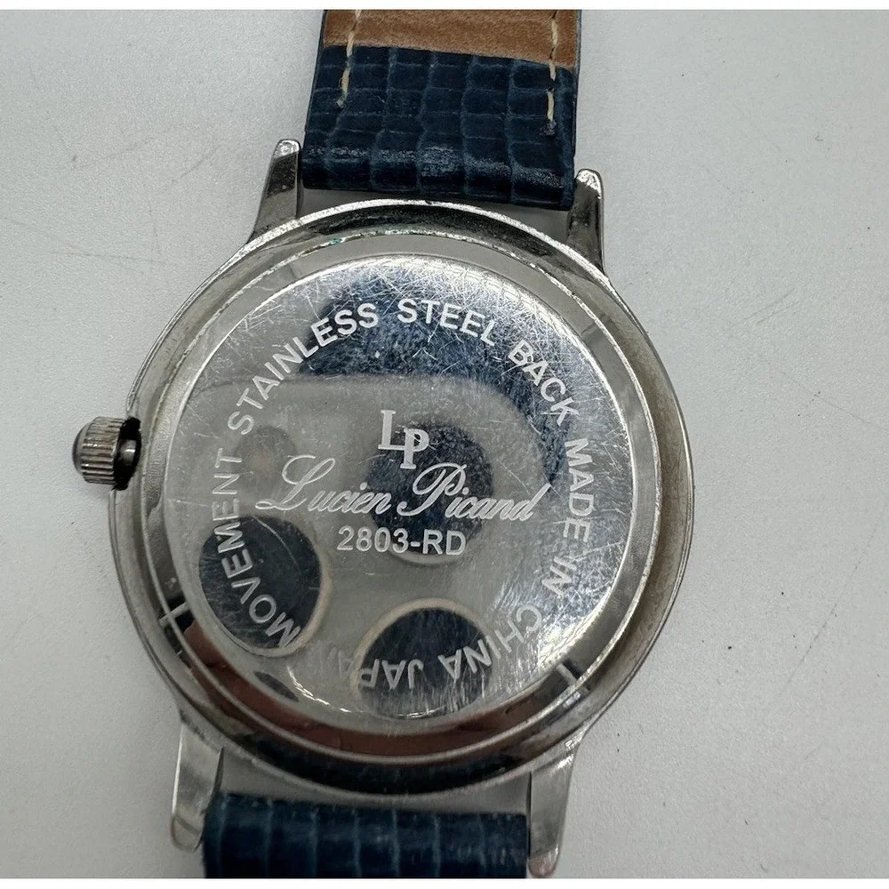 Lucien Piccard Diamond Watch Silver Tone Blue Leather Strap 2803-RD Roman Numera